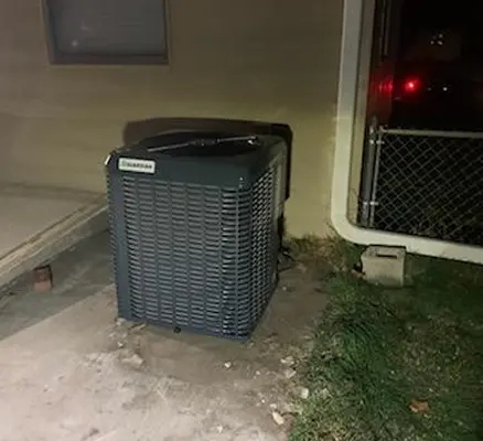 Air conditioning unit outside a building.