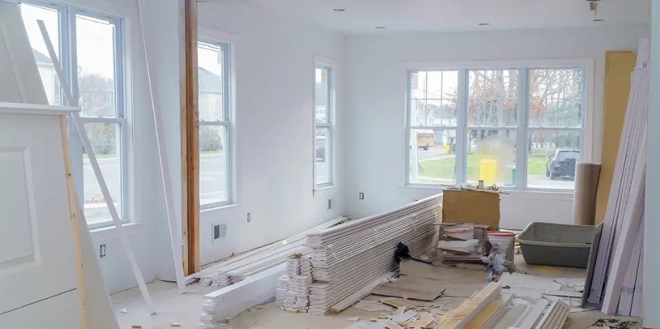 Room under construction with building materials.